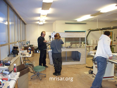 MRISAR Team members Autumn Siegel, John Siegel  and Michael Cook fabricating Robotic exhibits.