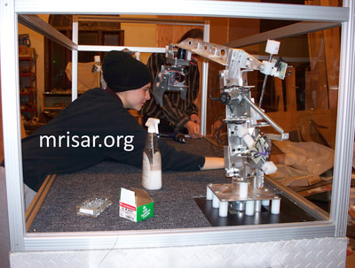 MRISAR Team members Autumn and John Siegel fabricating Robotic exhibits.