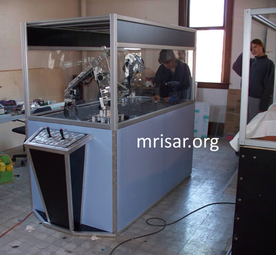 MRISAR Team members Victoria Croasdell Siegel and Autumn Siegel, fabricating Robotic Arm exhibits.