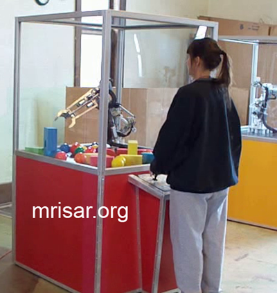 MRISAR's Team member Victoria Croasdell Siegel fabricating Robotic Arm exhibits.