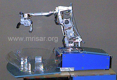 Robotics Interface Device with Facial Feature Controlled Robotics and Artificial sense of touch. MRISAR’s circa 2002 Rehabilitation Robotic; Facial Feature Controlled Activity Center, For Paralysis Victims.