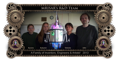 MRISAR's R&D Family Team Members;  Aurora Siegel, Autumn Siegel, John Siegel and Victoria Croasdell. Shown with Chibi-chan an interactive rail robot they created. 2013.