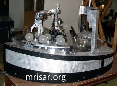 MRISAR's Custom 3 Finger, base mounted Robot Exhibit Kit! We fabricated this in 2004 for Sultan Bin Abdulaziz's Science Center. Seen here during the design and fabrication process.