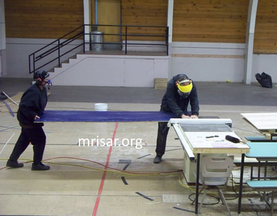 MRISAR Team members Victoria Croasdell Siegel and John Siegel fabricating Robotic exhibits.