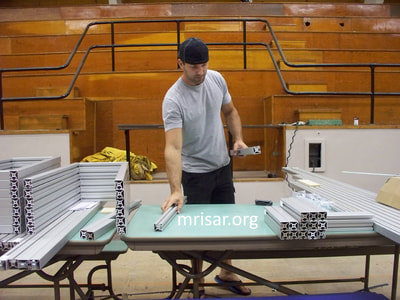 MRISAR's Team member Michael Cook fabricating Robotic exhibits.