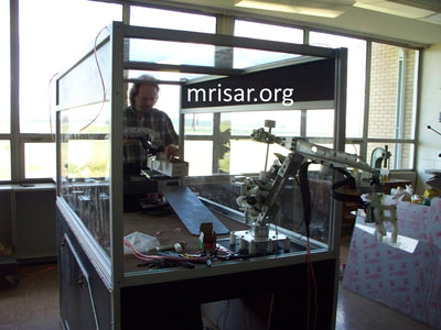 MRISAR's Team member John Siegel fabricating Robotic exhibits.