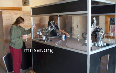 MRISAR Team members Autumn and Aurora Siegel fabricating Robotic exhibits. They are the youngest members of the MRISAR team and began their apprenticeship as preschoolers. 