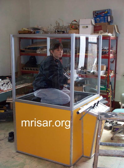 MRISAR Team member Victoria Croasdell Siegel fabricating one of our Robotic Arm exhibits.