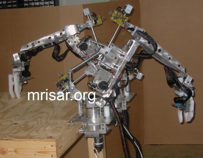 MRISAR’s interactive custom 3 Finger Robot Arm kits for the movie “The Last Mimzy”! These arms were rented for inclusion in several scenes with the scientists of the future! We sell them as kits, or as a complete exhibit, in our standard cases or in a custom case. We have been making exhibit robotics since 1991.