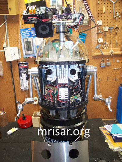 MRISAR’s R&D Team Inventing and Testing Chibi-chan the Robot Host prototype in 2013.