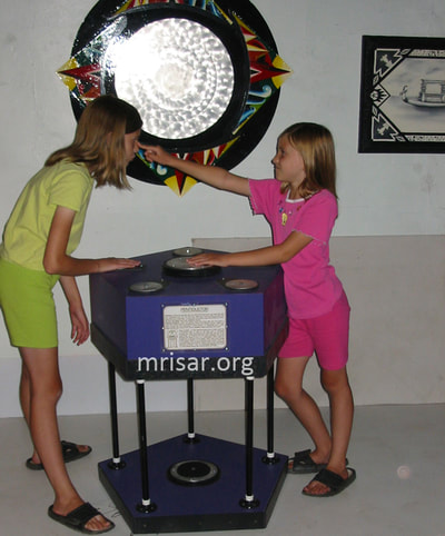 MRISAR's team members Autumn and Aurora Siegel, in 2003 testing our Pentiductor Exhibit. We have been making them since 1993.