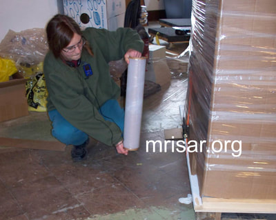 MRISAR Team member Aurora Siegel, prepping for shipping our Robotic Arm exhibits.
