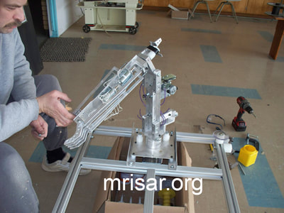 MRISAR's team fabricating our Rail Guided Robotic Arm Exhibits! We have been designing and fabrication them since 1991.