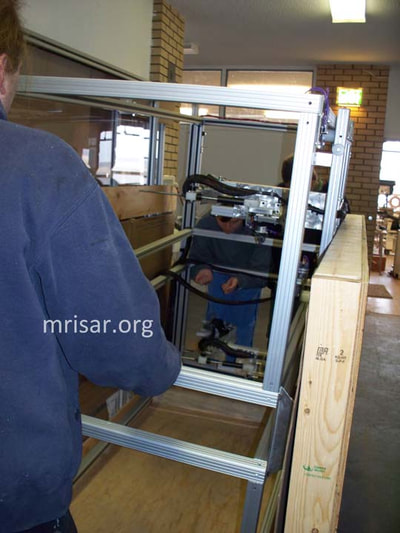 MRISAR Team members prepping for shipping our Robotic Arm exhibits.