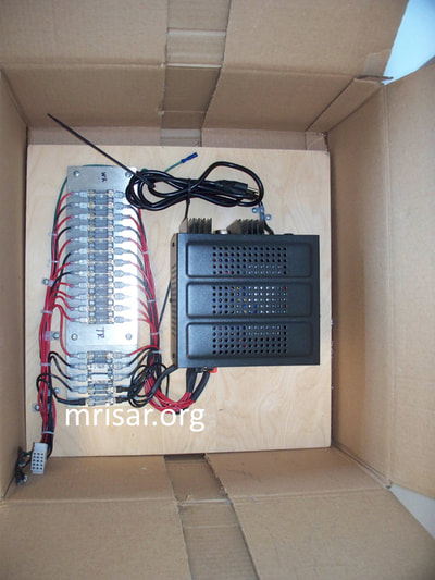 MRISAR's Robotic Arm exhibit kits. A custom power supply for a kit.