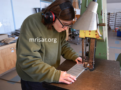 MRISAR’s team member Aurora Siegel making parts for our interactive regular or Telepresence exhibit grade 5 and 3 Finger Robot Arms! We sell them as kits, or as a complete exhibit, in our standard cases or in a custom case. We have been making exhibit robotics since 1991.