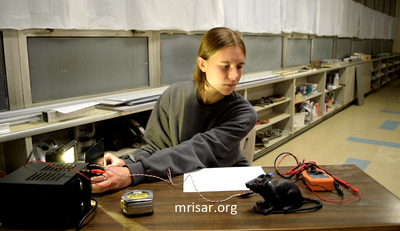 Interactive Science Exhibit; Super Photonic Pentiductor Exhibit, designed and fabricated by MRISAR. We have been making them since 1993. MRISAR's team member Autumn Siegel, making a Super Photonic Pentiductor Exhibit. 