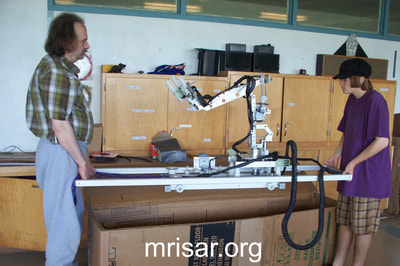 Robotic exhibit kits; MRISAR R&D Team packing a kit version of the Space Station Robotic Farming Simulator Exhibit.
