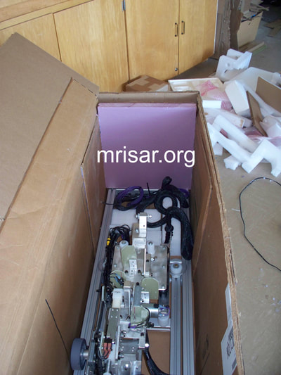 Robotic exhibit kits; MRISAR R&D Team packing a kit version of the Space Station Robotic Farming Simulator Exhibit.
