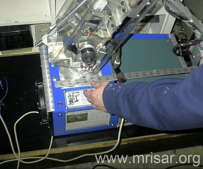 Robotics Interface Device with Facial Feature Controlled Robotics and Artificial sense of touch. MRISAR’s circa 2002 Rehabilitation Robotic; Facial Feature Controlled Activity Center, For Paralysis Victims.