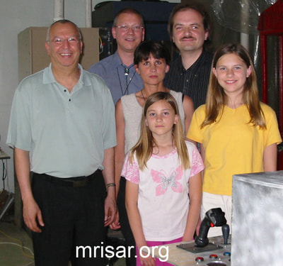MRISAR's Custom Challenge the Robot Exhibit Kit! We fabricated this in 2004 for Sultan Bin Abdulaziz's Science Center. Seen here is the MRISAR R&D Team (right) with two European representatives (left) for the Sultan when they came over to see the robotic kit prior to shipping it!