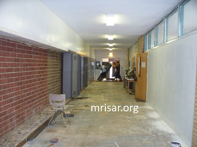 MRISAR's Team transforming the 36,000 sq. ft. former school in New Leipzig, into MRISAR's North Dakota Complex. We uncovered transoms, removed chalkboards, lockers, fluorescent lighting, basketball hoops and bleachers. We resurfaced and painted walls and ceilings. We retiled many floors and repaired skylights, roofs and plumbing.