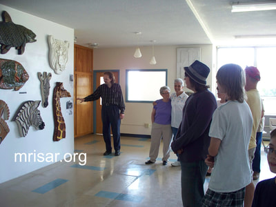 Visitors during a tour of MRISAR Galleries at our North Dakota Complex.